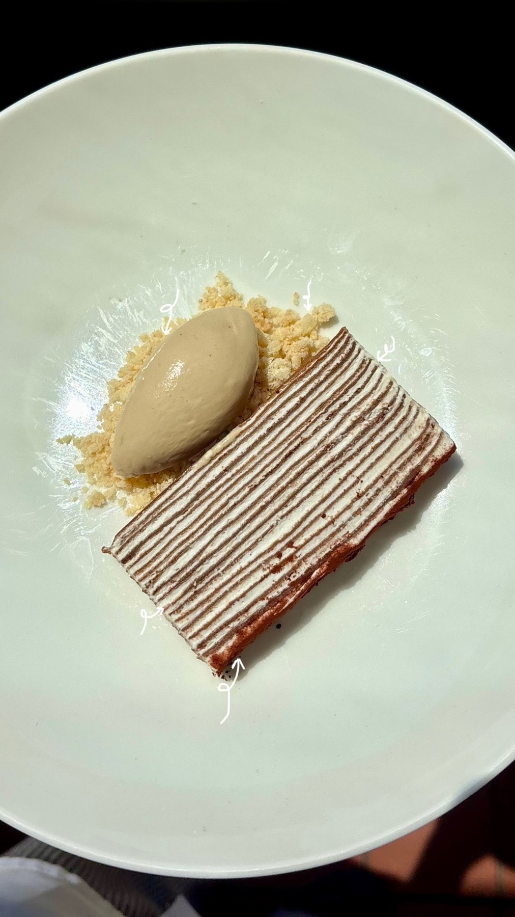 Mille crêpe slice with coffee quenelle and streusel crumb